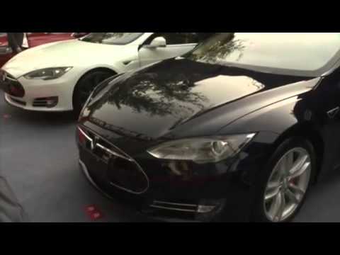 Raw: Tesla Delivers First China Cars