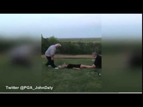 John Daly hits tee shot out of model’s mouth