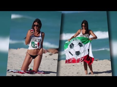 Italian Model Claudia Romani Gets patriotic On The Beach In A Thong Bikini