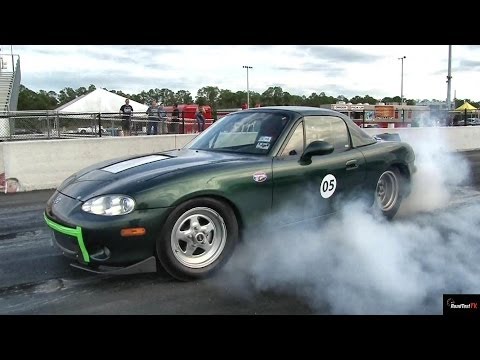 TESLA P85 Gets ZAPPED by Electric MIATA !!  – 1/4 mile Drag Race Video – Road Test TV