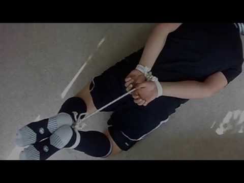 soccer boy is hogtied and try to escape