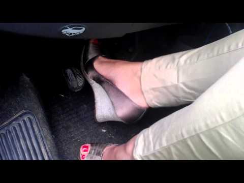 revving pedalpumping my cute little car barefoot in wedge heels