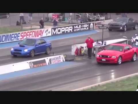 Mustang GT 5.0 vs Subaru WRX Drag Race