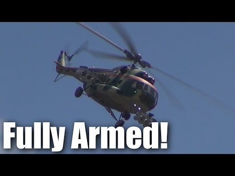 Huge jet powered RC helicopter fires real missiles