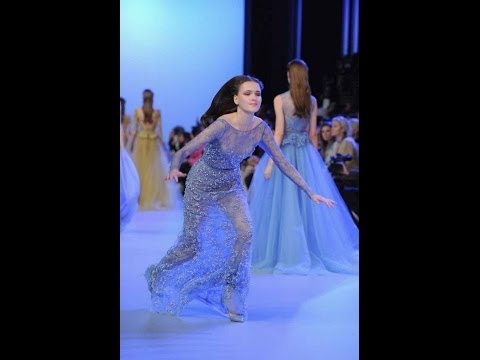 Model Jane Grybennikova falls down during Elie Saab Couture Spring/Summer 2014 TWO ANGLES OF VIEW